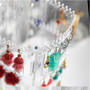 360 Rotating Clear Acrylic Earring Holder 4 Tier Jewellery Display Stand, product shown against a coloured background, standard product photograph