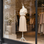 White Female Mannequin Torso with White Wooden Tripod Stand