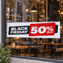 Black Friday up to 50% off poster displayed in a café window