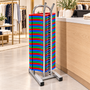 Chrome hanger stacker stand loaded with brightly coloured clothes hangers in a retail clothing display.