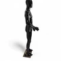 Side view of the glossy black faceless male mannequin