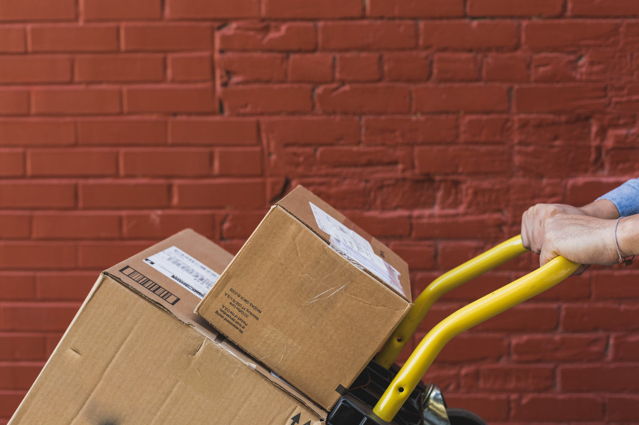 Parcels stacked on a sack trolley ready for dispatch