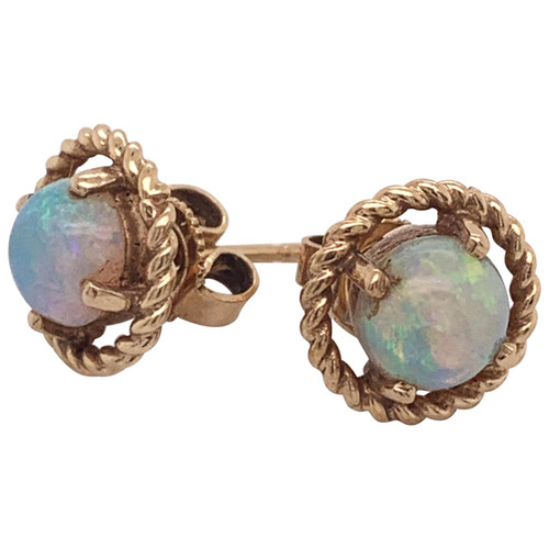 1.25 Carat Natural Opal Stud Earrings Framed with Ropes of 14 Karat Yellow Gold