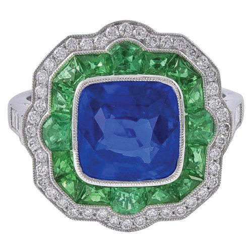 Surprising Platinum Two-Tone Sapphire and Emerald Ring with Pave Set Diamonds