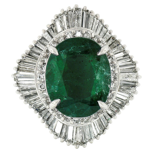 Platinum GIA 5.59 Carat Oval Emerald and Baguette Diamond Wave Ballerina Ring