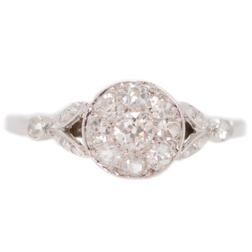 1920s 0.60 Carat Total Weight Diamond Cluster, 18 Karat White Gold Ring
