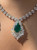 8.96 Carat Pear shape Emerald and Mix Shape Diamond Drop Necklace in Platinum