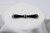 A 0.55 Carat Signed Art Deco Dreicer Platinum & Black Onyx Bow  Brooch