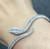 2.47 Carat Diamond and 0.04 Carat Ruby Snake, Snake Diamond and Ruby Bracelet