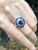 Blue Sapphire with Diamond Ring Set in 18 Karat White Gold Settings
