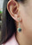 Blue Sapphire with Emerald and Diamond Earrings Set in 18 Karat Gold Settings