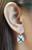 Emerald, Blue Sapphire with Diamond Earrings Set in 18 Karat White Gold Settings