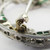 1925 Art Deco Platinum Emerald Diamond Circle Pin