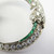 1925 Art Deco Platinum Emerald Diamond Circle Pin