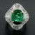 Platinum GIA 5.59 Carat Oval Emerald and Baguette Diamond Wave Ballerina Ring