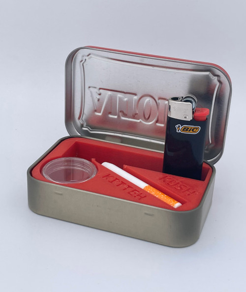 Kush Kitteh 3D-printed Altoids tin stash box organizer insert inside a classic metal tin, showcasing a complete travel dugout setup with a mini lighter and pipe.