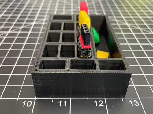 Kush Kitteh Trustik XL 3D-printed desktop vape pen organizer and charging dock stand showing a high-capacity storage layout.
