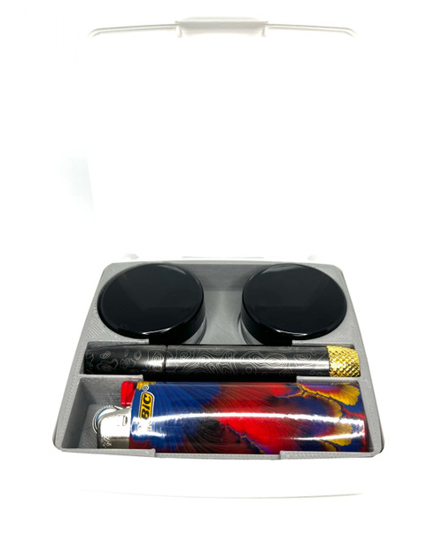 Open view of the custom 3D-printed PRO storage insert showing dedicated slots for a full-size BIC lighter, two ingredient jars, and the Vessel Helix.