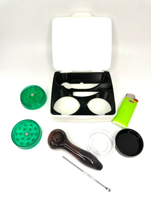 Image 1 (Primary / Featured Image): Kush Kitteh The Roadie complete 3D-printed pocket travel pipe kit and metal tin organizer showing the full setup.