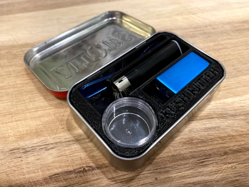 Kush Kitteh custom 3D-printed Altoids tin pocket stash box showing the complete travel kit setup with magnetic pipe.