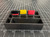 Close-up view of the precision-molded charger cable integration channel at the base of the Trustik storage dock.