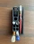 ush Kitteh 3D-printed angled desktop cartridge organizer stand holding 8 individual storage pieces cleanly.
