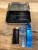 The pocket travel stash components displayed together including the metal outer tin, durable PLA insert, magnetic travel pipe, and mini lighter.
