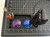 Top angle of the storage dock highlighting the central Crafty Plus docking bay and side accessory compartments.