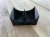 lose-up showing the debowler ashtray insert removed from its dedicated tray compartment for easy cleaning.