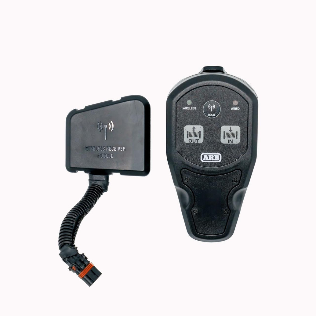 ARB Wireless 2.4Ghz Hand Controller & Receiver ARWA009, black wireless remote control with multiple buttons and receiver module connected via a flexible cable.