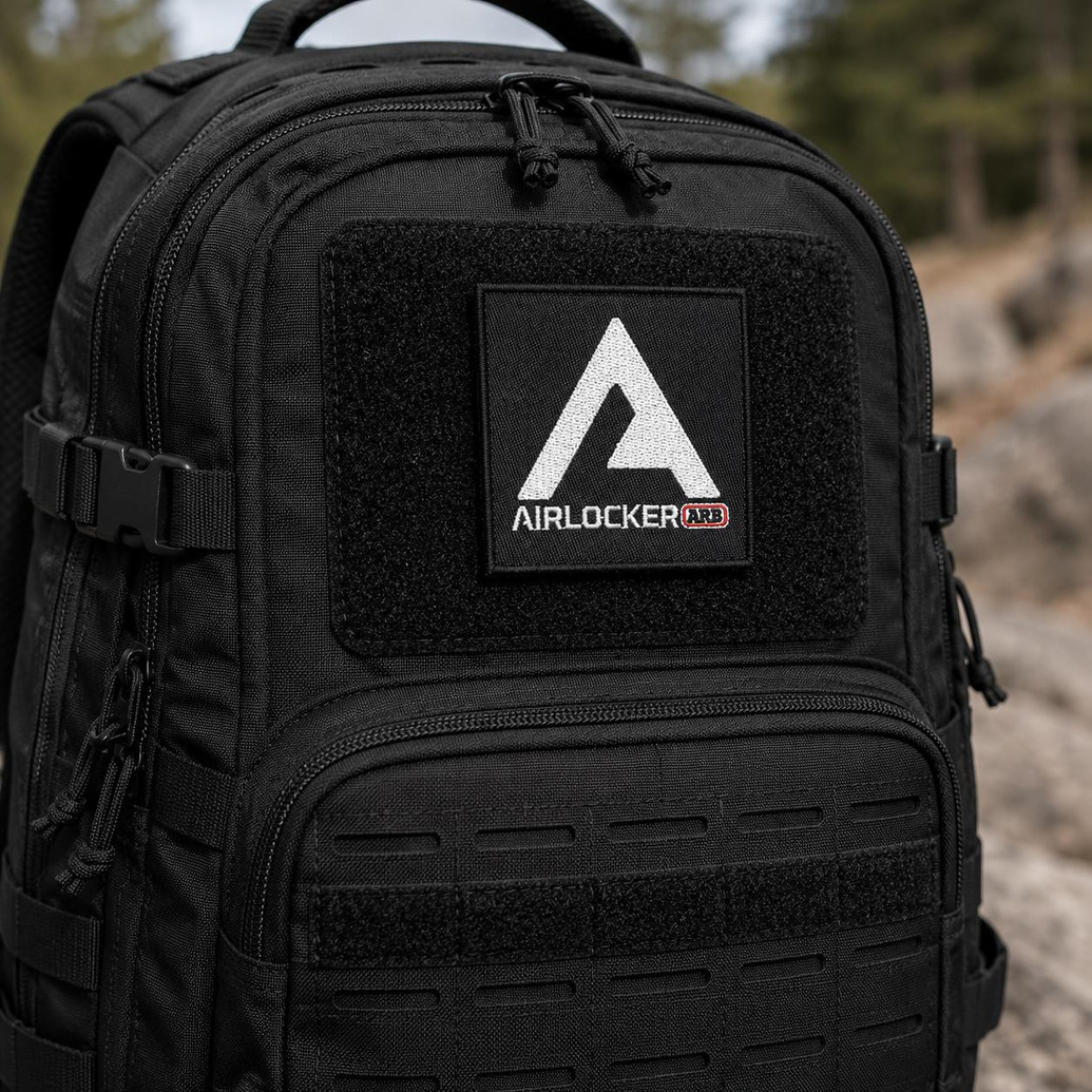 ARB Air Locker Embroidered Patch 3"x3" ARB3510, black patch with white and red embroidered ARB Air Locker logo on a black backpack.