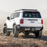Old Man Emu MT64 Kit FR 3 in/0 lb, RR 2 in/440 lb 2119K, vehicle suspension upgrade for off-road Toyota Land Cruiser, rugged off-road vehicle with large tires on desert terrain.