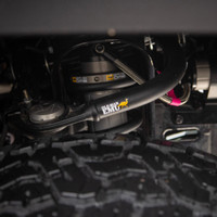 Old Man Emu BP-51 Kit FR 3 in/0-330 lb, RR 2 in/0 lb 2217K, vehicle suspension upgrade kit, installed on off-road vehicle with visible shocks and suspension components.
