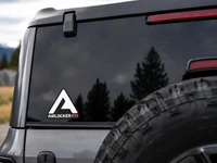 ARB Air Locker Sticker 3.5 W, white and red logo sticker on the back window of a vehicle.