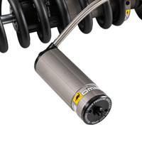 Old Man Emu BP-51 Coilover Strut Front Right BP5190036R, a high-performance vehicle suspension component with a metallic coil spring and shock absorber, ideal for off-road and enhancing vehicle stability.