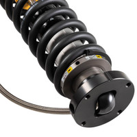 Old Man Emu BP-51 Coilover Strut Front Right BP5190036R, automotive suspension component with black coil spring, metal mount, and braided hose, designed for off-road vehicle suspension upgrade.