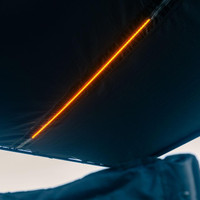 ARB Hard Case Awning with Light, close-up of the orange LED light strip installed on the underside of the black hard case.