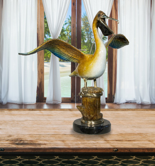 Pelican On Marble Base in Special Patina 27 Inch Wide