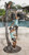Two Kids with Cat on Tree