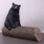 American Black Bear on Tree Trunk Sculpture