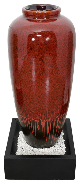 Red Bubbling Fountain With Base Close Up Image
