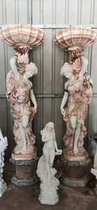 Pair of Marble Ladies holding Urns