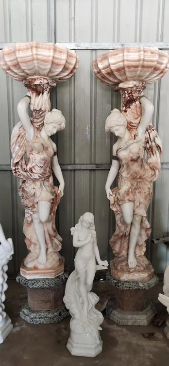 Pair of Marble Ladies holding Urns