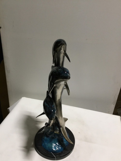 Family II Three Dolphins on Marble Base in Special Patina 23 Inches Tall Room Scene