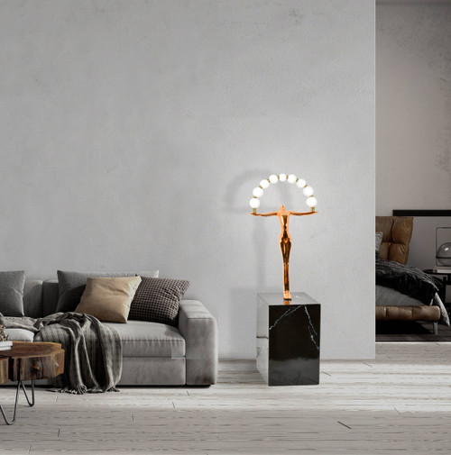 Gold Figurine on Pedestal with Lights