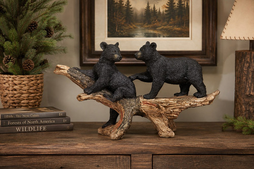 Playful Bear Cubs on Branch Statue