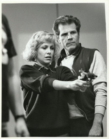 

High Quality Printed Behind The Scenes Photo Autographed by Tom Holland.

Tom directs Catherine Hicks in the iconic scene where she confronts Chucky in the hallway of the apartment.  