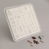Clear Jelly Stamper Santa's Worshop mini nail stamping plate, available in the USA at www.lanternandwren.com.