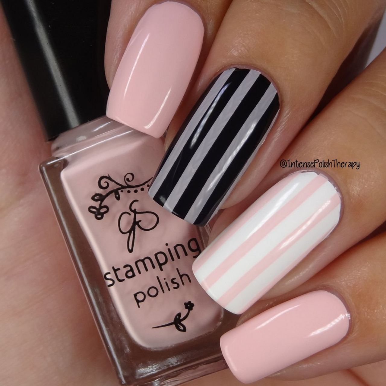 Pretty in pink: Valentine's Day nail art with Zodiac rhinestones.