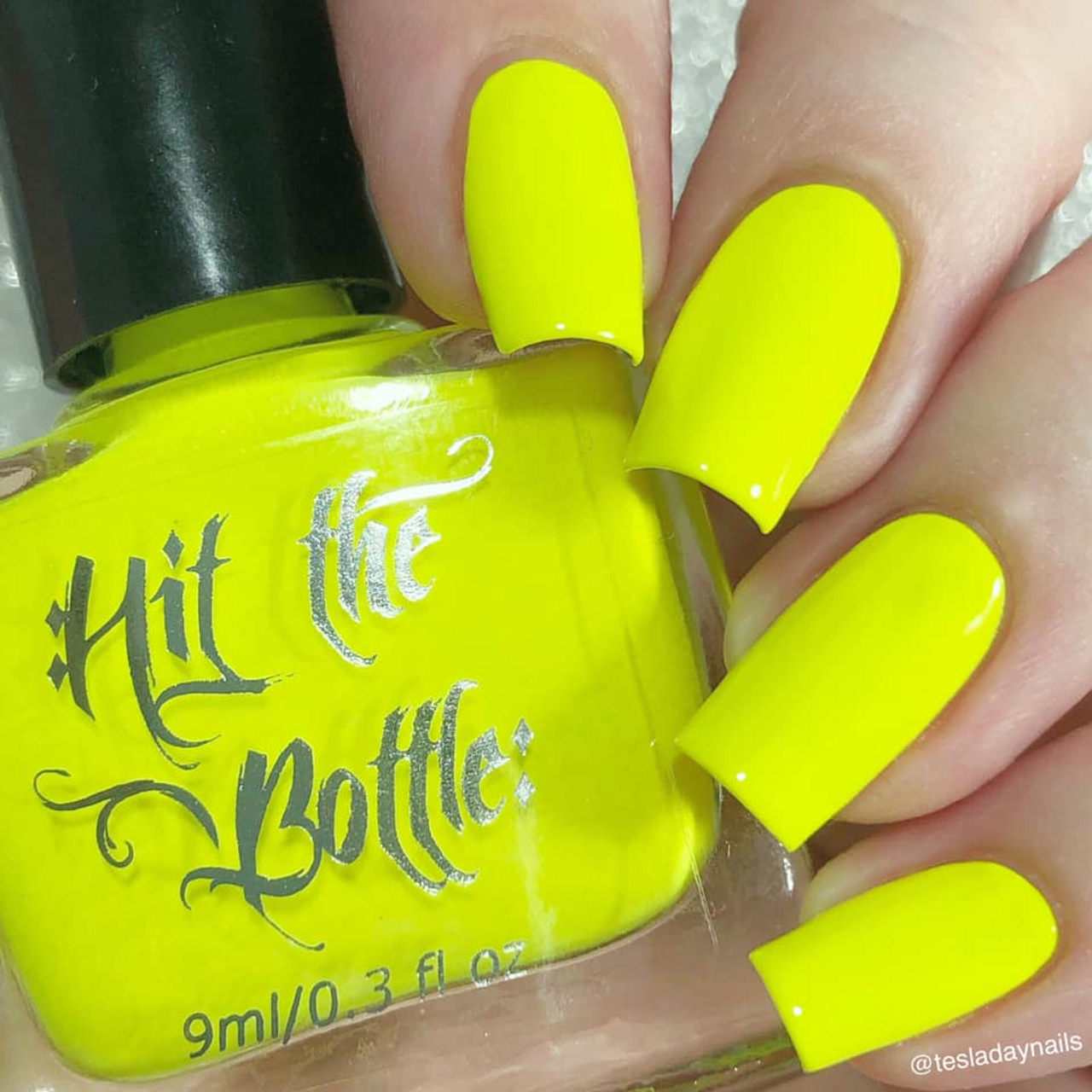 yellow nail polish bottle